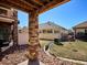 Patio view featuring the backyard and an exterior drain at 19368 E Quincy Pl, Aurora, CO 80015