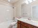 A full bathroom featuring white tile and a single sink at 19368 E Quincy Pl, Aurora, CO 80015
