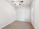 Neutral bedroom with a ceiling fan, window and natural light at 19368 E Quincy Pl, Aurora, CO 80015