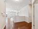 Spacious living room with hardwood floors, neutral paint, and ample natural light, perfect for relaxation at 19368 E Quincy Pl, Aurora, CO 80015