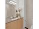 Bathroom with minimalist vanity, mirror, and neutral decor at 2314 S University Blvd, Denver, CO 80210