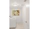 Clean, bright laundry room with modern washer and dryer and ample space for storage at 2314 S University Blvd, Denver, CO 80210
