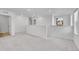 Upstairs hallway with carpet, white trim and white walls at 17836 Gallup St, Broomfield, CO 80023