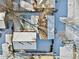 Aerial view of home and surrounding neighborhood in winter at 1070 W Oxford Ave, Englewood, CO 80110