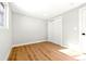 Bright bedroom with light walls and wood flooring at 1070 W Oxford Ave, Englewood, CO 80110