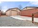 Newly constructed detached garage with gravel driveway at 1070 W Oxford Ave, Englewood, CO 80110