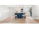 Open concept kitchen with a navy island and breakfast bar seating at 1070 W Oxford Ave, Englewood, CO 80110