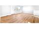 Spacious living room with light wood floors and an abundance of natural light at 1070 W Oxford Ave, Englewood, CO 80110
