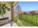 Private back patio with artificial turf and planters, offering a serene outdoor retreat at 3663 S Sheridan Blvd # 14, Denver, CO 80235