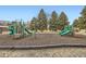 Community playground with slides and climbing structures, perfect for outdoor activities at 3663 S Sheridan Blvd # 14, Denver, CO 80235