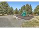 Inviting community playground with slides and benches, ideal for Gathering-friendly fun and relaxation at 3663 S Sheridan Blvd # 14, Denver, CO 80235