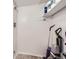 Small storage area with white walls and shelving, perfect for organizing cleaning supplies and other essentials at 3663 S Sheridan Blvd # 14, Denver, CO 80235