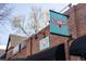 A brick building with appealing Scoops signage at 2088 Kearney St, Denver, CO 80207