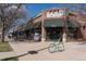 Charming retail storefront 'Little Bird' with a classic brick facade and ample pedestrian access at 2088 Kearney St, Denver, CO 80207