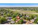 Charming home surrounded by lush greenery, located near open green spaces, perfect for outdoor enjoyment at 19398 E Eastman Pl, Aurora, CO 80013