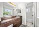 This bathroom features a sink, vanity, mirror, and a shower/tub at 19398 E Eastman Pl, Aurora, CO 80013