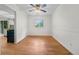 Inviting dining room with hardwood floors, wainscoting, and ample natural light from a large window at 19398 E Eastman Pl, Aurora, CO 80013