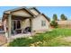 Backyard patio featuring a comfortable seating area perfect for outdoor enjoyment and relaxation at 3469 Amber Sun Cir, Castle Rock, CO 80108