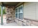 Charming exterior detail showcasing stone accents and modern siding at 3469 Amber Sun Cir, Castle Rock, CO 80108