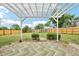 Cozy backyard with a pergola covered patio and a fenced perimeter at 3932 S Pagosa St, Aurora, CO 80013