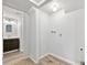 Basement laundry area with utility sink and access to a bathroom at 3932 S Pagosa St, Aurora, CO 80013