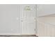 Bright entryway features a white front door with decorative glass and white trim at 3932 S Pagosa St, Aurora, CO 80013