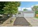 Charming home with a well-maintained front yard, mature trees, and an inviting entrance at 3932 S Pagosa St, Aurora, CO 80013