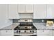Well-equipped kitchen features stainless steel appliances and plenty of cabinet space at 3932 S Pagosa St, Aurora, CO 80013