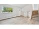 Entryway features a bright window, front door, and stairs to the second floor at 3932 S Pagosa St, Aurora, CO 80013
