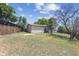Spacious backyard with a wooden fence, large grass area and two story home at 5372 E 108Th Pl, Thornton, CO 80233