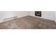 Cozy basement with fireplace and white brick surround for added charm at 5372 E 108Th Pl, Thornton, CO 80233