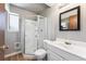 Bathroom featuring a shower, vanity, and a washer/dryer at 5372 E 108Th Pl, Thornton, CO 80233