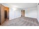 Spacious bedroom features neutral carpet, white walls, and a walk-in closet at 5372 E 108Th Pl, Thornton, CO 80233