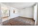 Bright living room features neutral carpet and wall color with open access to the adjacent kitchen at 5372 E 108Th Pl, Thornton, CO 80233