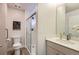 Clean bathroom features a tiled shower, modern fixtures, and ample lighting at 65 Avocet Ct, Longmont, CO 80501