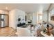 Open-concept living room flows seamlessly into the kitchen, creating an inviting space for entertaining at 65 Avocet Ct, Longmont, CO 80501