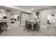 Finished basement dining area featuring a decorative palm tree print at 2805 S Sherman St, Englewood, CO 80113