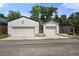 Detached two-car garage and a separate one-car garage, with a paved driveway at 2805 S Sherman St, Englewood, CO 80113