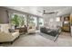 Spacious main bedroom with large windows, stylish decor, and elegant seating area at 2805 S Sherman St, Englewood, CO 80113