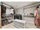 Organized walk-in closet with ample storage, shelving, and clothing racks, complete with a center island at 2805 S Sherman St, Englewood, CO 80113