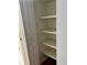 Interior closet with open shelving, offering storage solutions at 7755 E Quincy Ave # 203A6, Denver, CO 80237