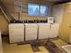 Clean laundry room with multiple washing machines and dryers available for tenant use at 7755 E Quincy Ave # 203A6, Denver, CO 80237