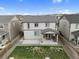 Aerial view of home showcasing spacious backyard and patio at 16369 Alberta Dr, Parker, CO 80134