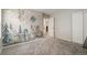 Bedroom featuring carpet and a dragon mural wall at 16369 Alberta Dr, Parker, CO 80134
