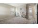 Bedroom featuring carpet and a dragon mural wall at 16369 Alberta Dr, Parker, CO 80134