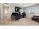Upper level loft area features a spacious layout, perfect for multiple workstations and entertainment at 16369 Alberta Dr, Parker, CO 80134