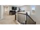 Upstairs loft with multiple workstations and a view, great for an office or entertainment area at 16369 Alberta Dr, Parker, CO 80134