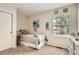 Comfortable bedroom with a cozy bed, bright window and neutral decor creating a relaxing atmosphere at 6792 E Briarwood Dr, Centennial, CO 80112