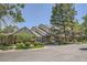 Attractive townhome community with lush landscaping and well-maintained exteriors providing comfortable and appealing neighborhood living at 6792 E Briarwood Dr, Centennial, CO 80112