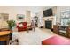 Comfortable living room features a cozy fireplace, plush seating, and stylish decor for a relaxing ambiance at 6792 E Briarwood Dr, Centennial, CO 80112